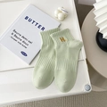 Hellgrüne Baumwoll-Socken mit goldener H-Stickerei und vertikaler Strickstruktur - Einheitsgröße / Grün