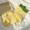 Contrast crew socks in vibrant yellow and green with elegant vertical knit texture - One Size / Yellow and Green Color Block