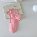 Pastel pink cotton crew socks with ribbed cuffs on a clean aesthetic background - Pink