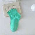 Solid mint green cotton crew socks with ribbed cuffs for women in minimalist style - Green