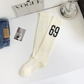 Chaussettes mi-mollet blanc crème côtelées avec motif chiffre 69 noir pour look sport - Taille unique / Blanc (Numéro 69)