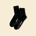 Black crew socks with white hello text, ribbed cotton athletic style for women - One Size / Creamy Black