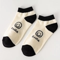 Low cut black and white smile face socks made of breathable cotton blend fabric - TC Single Smile Pattern