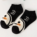 Black cotton low cut socks featuring white cartoon penguin pattern and slogan print - TC Half Smile On Toe