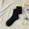 Classic black knit knee high socks for women in minimalist Japanese jk school style - One Size / Black