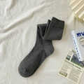 Women's dark grey ribbed knit calf-high cotton socks on a decorative white background - One Size / Gray