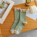 Retro green tulip crew socks for women featuring pink flower embroidery and ribbed cotton - Green Flower