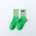 Chaussettes mi-hautes bicolores vert dégradé avec étiquette de marque tissée - Taille unique / Vert 1 Paire
