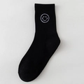 Women black mid-tube cotton socks featuring a white embroidered smiley face design - One Size / Black