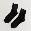 Minimalist solid black mid-calf cotton socks with ribbed cuffs for women - Black