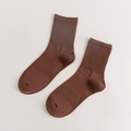 Deep brown solid color mid-calf cotton socks with vertical ribbed texture and warm knit - Brown