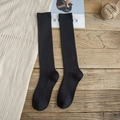 Women's black over-the-knee cotton socks in ribbed knit for winter warmth - Black