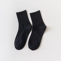 Classic solid black mid-calf cotton crew socks with elastic ribbed cuffs for women - One Size / Black