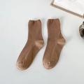 Caramel brown ribbed crew socks with elastic cuffs in a minimalist mid-tube style - Brown