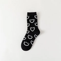 Chaussettes mi-mollet noires en coton avec motifs sourires blancs et bords côtelés - Noir avec Sourire Blanc
