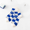 Klein blue checkerboard crew socks with smile face and nice text print on white background - Blue Checkerboard Smiley (NICE)