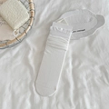 White ballet-style crew socks featuring ruffled edges and ribbed knit cotton texture - White