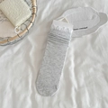 Light grey ribbed ballet-style crew socks featuring sweet white lace ruffle trim details - Light Gray