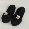 Black low cut ankle socks with a cute yellow duck label on a minimalist background - Black Duck/Monster