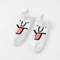 White ankle socks featuring minimalist cartoon face with pink tongue expression - White