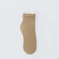Brown ribbed velvet knit socks with elastic cuffs and paper tag shown on white background - Khaki
