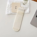 Minimalist beige mulberry silk crew socks with vertical ribbed knit texture for women - One Size / Cream
