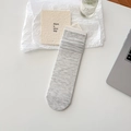 Light gray knit silk blend crew socks with retail hanger tag on minimalist background - One Size / Light Gray