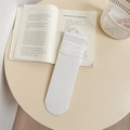 White silk knit mid-calf socks with delicate hollow bow patterns and ribbed cuffs - White