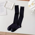 Classic black mid-calf socks in mulberry silk, ribbed cuffs on minimalist white background - One Size / Black