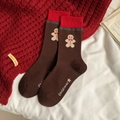 Braune Weihnachts-Socken mit Lebkuchenmann-Mustern und roten Rippbündchen - Lebkuchenmann / Kaffeebraun