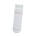 White cotton slouch socks with ribbed cuffs and loose fit style in product packaging - White