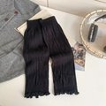 Thick black knitted leg warmer with diamond patterns and sweet ruffle edge details - Black