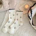 White cashmere crew socks with pink floral pattern and black wavy scalloped trim - One Size / Creamy White