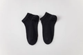 Women's low-cut black cotton socks with breathable mesh vents and elastic cuffs - Black