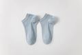 Light blue mesh cotton ankle socks for women featuring breathable knit and ribbed cuffs - Blue