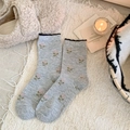 Light gray cashmere blend socks with pink floral pattern and black ruffled cuffs - One Size / Light Gray