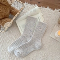 Calze di lana beige con macchie colorate e trama a coste per il massimo comfort invernale - Bianco