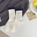 Cream ballet style ribbed cotton socks with navy blue trim and silver bow charm detail - One Size / White Heart Bow