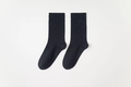 Classic deep black mid-calf cotton socks featuring a comfortable ribbed knit texture - One Size / Black