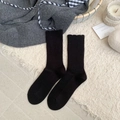 Women's black thick knit faux wool mid-tube socks with elegant ruffled cuffs - Black