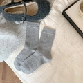 Gray wool socks featuring silver button detail and ribbed cuffs in a cozy winter style - One Size / Light Gray