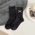 Damensocken in Schwarz mit Punkten und cremeweißen Schleifenverzierungen aus Satin - Schwarz