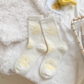 Warm off-white mid-tube thermal socks with yellow flower pattern in coral fleece - Elegant Flower
