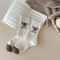 Calze di lana spessa Fair Isle color crema con punte marroni e simpatico motivo puppy - Taglia unica / Bianco