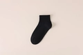 Calcetines cortos negros de algodón con puño acanalado y diseño minimalista clásico - Talla única / Negro