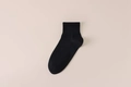 Schwarze Herren-Sportsocken aus Baumwolle mit minimalistischem Rippbündchen-Design - Einheitsgröße / Schwarz
