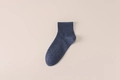Single navy blue men's cotton crew sock featuring ribbed cuffs and a breathable texture - One Size / Blue