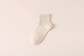 Men's cotton crew socks in beige oat color with ribbed cuffs and mottled texture - One Size / Khaki