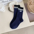Calcetines azul marino de algodón con puños a rayas y una pequeña etiqueta de marca - Talla única / Azul Marino