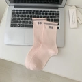Pink mid-calf cotton socks featuring grey stripes and number 05 with ribbed texture - Pink